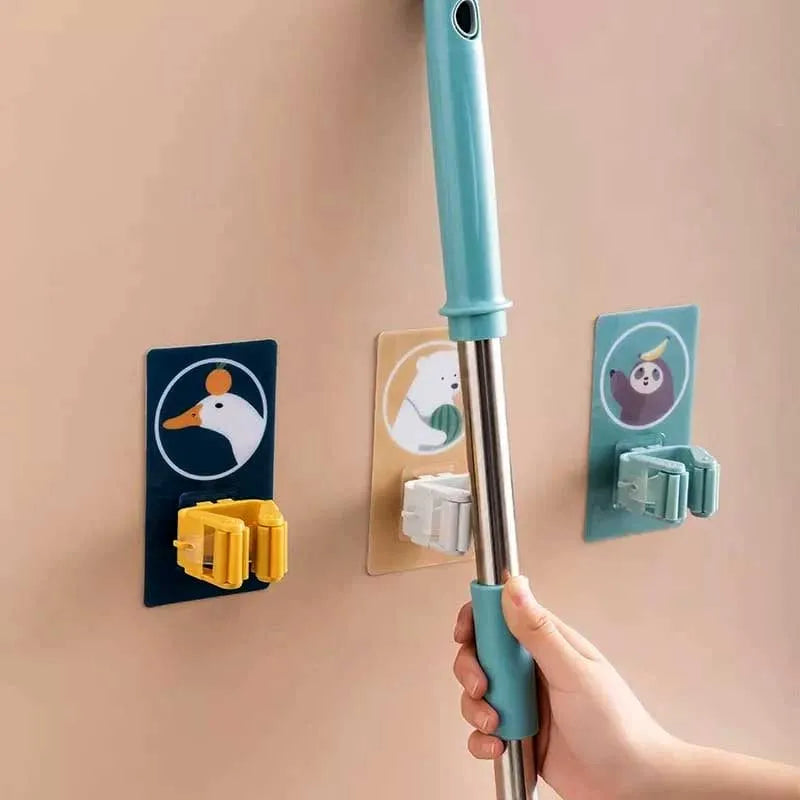 wall mounted self adhesive character broom mop holder for home, kitchen and wardrobe main image